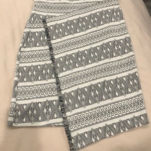 Asymmetrical patterned wrap skirt